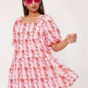 Nasty Gal pink pattern puff sleeve dress.